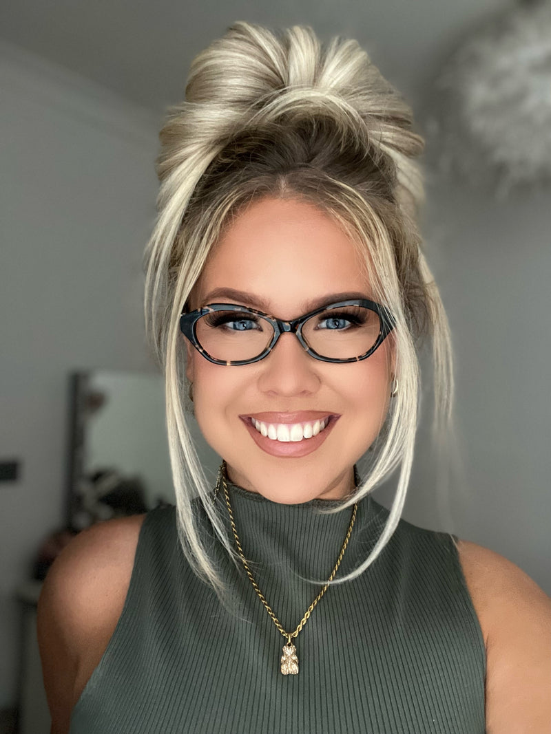 Woman wearing Vespera tortoiseshell eyeglasses